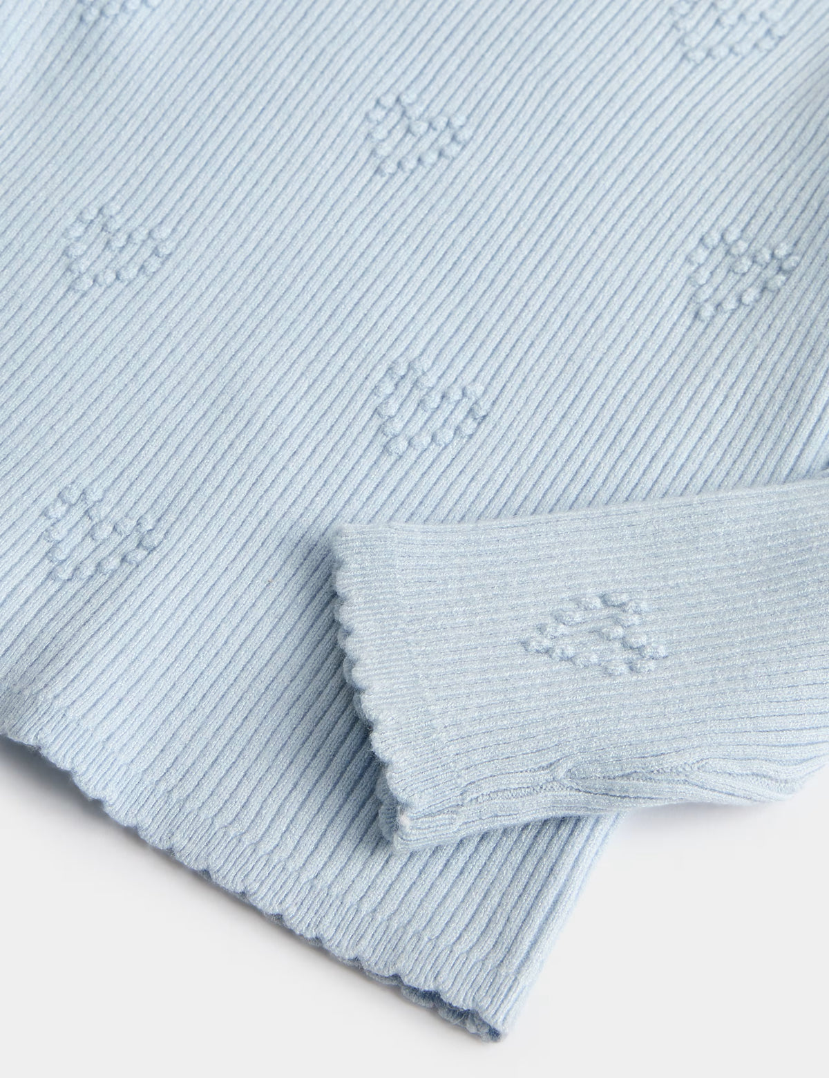Haut tricoté texturé en forme de cœur