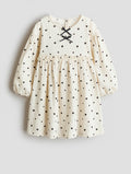 ROBE FROISSÉE AVEC NŒUDS