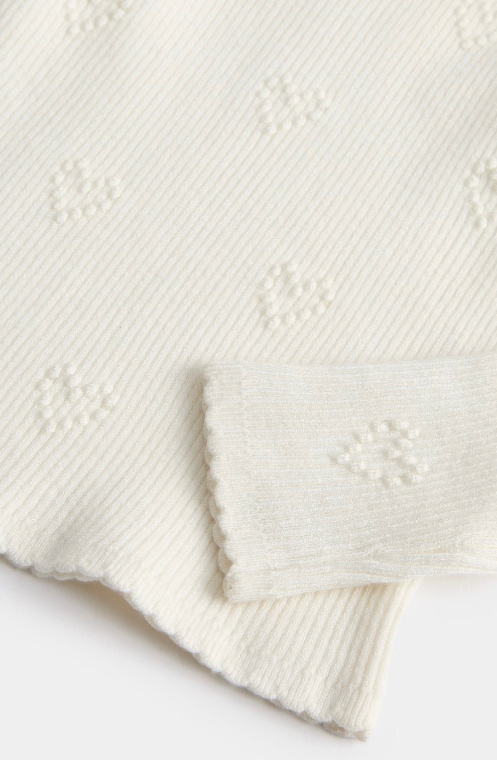 Haut tricoté texturé en forme de cœur